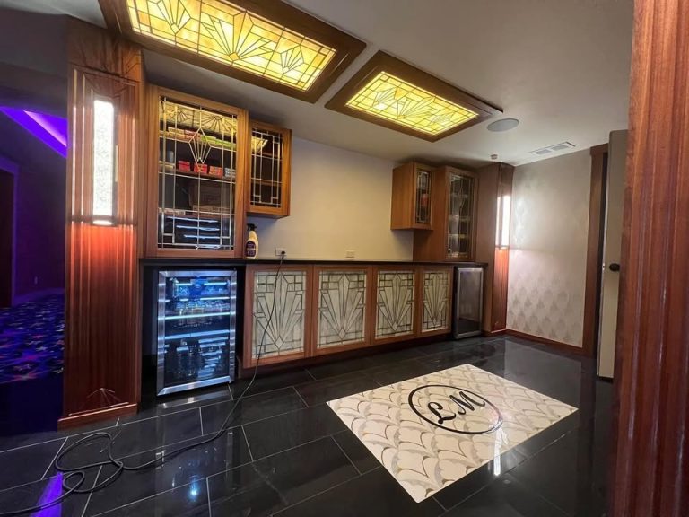 Next Level Engraving Unveils a Marble & Brass Room
